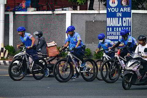 Keeping watch for public safety Bike patrol officers from the Manila Police District patrol the streets, ensuring visibility and security during the observance of All Saints’ Day.(PHOTOGRAPH BY KING RODRIGUEZ FOR THE DAILY TRIBUNE)