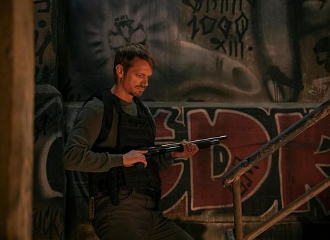 Joel Kinnaman in ‘Silent Night.’ | PHOTOGRAPH COURTESY OF Lionsgate