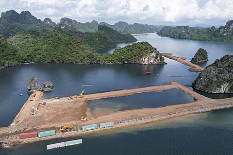 The bay, famed for its brilliant turquoise waters dotted with towering rainforest-topped limestone islands, is one of Vietnam's most popular tourist destinations, attracting more than seven million visitors last year. (Photo: AFP)