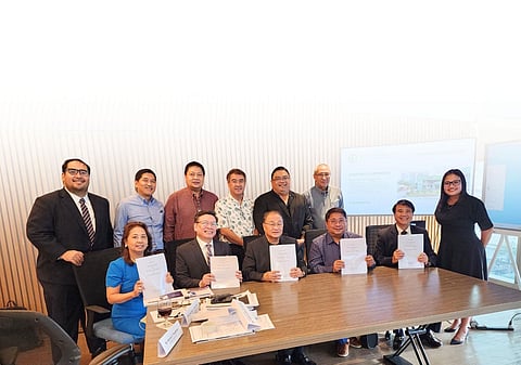 Metro Pacific Health chairman Manuel V. Pangilinan (seated, third from left) with (standing): Alvin John Merced (MPH AVP-Business Development), Odie Tayag, Dr. Jaimar Sapungan, Dr. Francis Daya, Manuel Rivera, Dr. Pio Pajarillo and Joan Isip (GIV Capital, majority sellers advisors); (seated) Dr. Farah Perez-Tayag (majority sellers representative); Jose Noel C. de la Paz (MPH director for Corporate Development); Dr. Gerard Salazar (majority sellers representative); and Conrad Gloria (GIV Capital, majority sellers advisor).