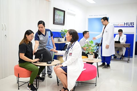 Inside the new spacious hub, UP-PGH Division of Pulmonary Medicine chief Dr. Lenora Fernandez (third from left) and her colleagues are able to attend to patients efficiently.
(PHOTOGRAPHS COURTESY OF SM FOUNDATION)