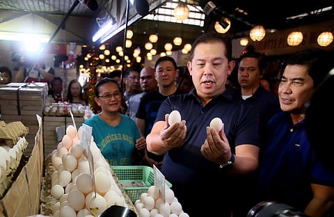 SPEAKER Martin Romualdez checks eggs for size against their retail price in the Farmers Market in Quezon City on Monday as the House of Representatives makes good its pledge to exercise its oversight function in easing inflation. | PHOTOGRAPH BY ANALY LABOR FOR THE DAILY TRIBUNE @tribunephl_ana