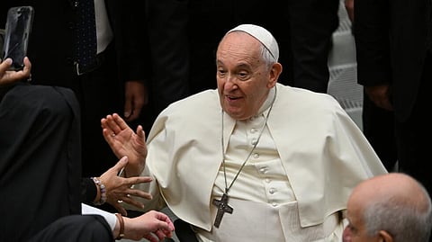 Pope dismisses critical bishop
