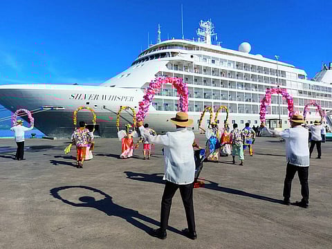 Puerto Princesa tourism performers welcome the arrival of MS Silver Whisper, one of six cruise vessels expected in the city this month of November. (Photo from the PPC Tourism Department)
