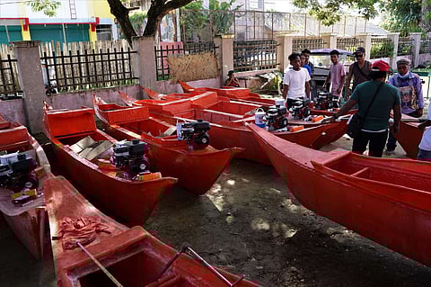 Fiberglass boats given to Palawan fishermen in post-Odette rehab effort