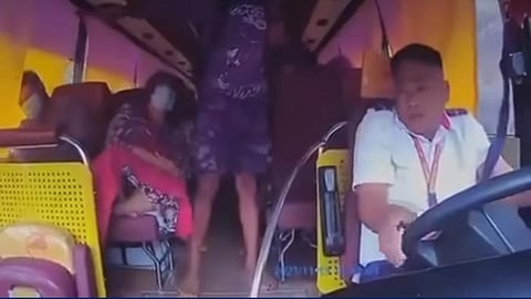 Screen grab from the viral video of the CCTV footage showing the gunmen shooting at close-range at a man and a woman inside the bus on 15 November 2023 at Barangay Minuli, Carranglan, Nueva Ecija.