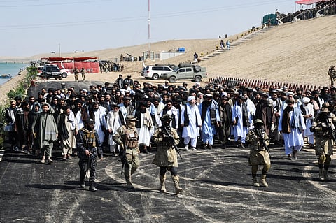 The senior leadership of the Taliban government arrives for the second inauguration phase of the Qosh Tepa Canal project in Hairatan, Balkh Province, on October 11, 2023. (Photo by Atif ARYAN / AFP)