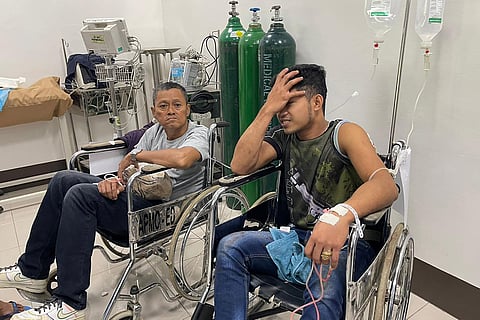 Injured people are treated at Amai Pakpak Medical Center in Marawi, Lanao del sur province, after a bomb attack during a Catholic mass at Mindanao State University's gymnasium. At least three people were killed and seven wounded in a bomb attack on a Catholic mass in the insurgency-plagued southern Philippines on December 3, officials said. (Photo by Merlyn MANOS / AFP)