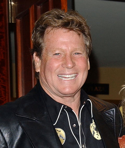 Actor Ryan O'Neal attends the 51st annual Share Boomtown party held at the Century Plaza hotel in Los Angeles on 15 May 2004. Actor and heartthrob Ryan O'Neal, the Oscar-nominated star of films such as "Love Story" and "Barry Lyndon," has died, his son said on 8 December 2023. He was 82. (Photo by Chris DELMAS / AFP)