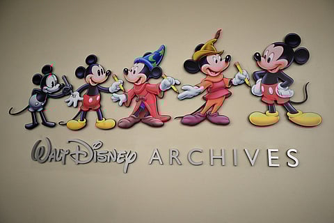 (FILES) Mickey Mouse animations annouce the entrance to the Walt Disney Archives during a media tour of the Disney Studio and Walt Disney Archives,on 20 June 2023 at the Disney Studio lot, in Burbank, California. Almost a century after his big-screen debut, Mickey Mouse enters the public domain on 1 January 2024, opening the floodgates to potential remakes, spin-offs, adaptations... and legal battles with Disney.
The copyright on "Steamboat Willie" -- a short, black-and-white 1928 animation that first introduced audiences to the mischievous rodent who would become emblematic of American pop culture -- expires after 95 years, on 1 January, under US law. (Photo by Robyn Beck / AFP)