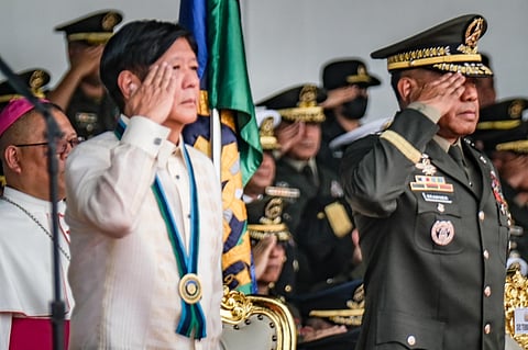 President Ferdinand Romualdez Marcos Jr. leads the 88th anniversary celebration of the Armed Forces of the Philippines at Lapu Lapu Grandstand, Camp Aguinaldo in Quezon City on Thursday, 21 December 2023. Joining the president on stage are AFP Chief Romeo Brawner Jr., House Speaker Martin Romualdez and former president Gloria Macapagal- Arroyo. | Photo by Yummie Dingding