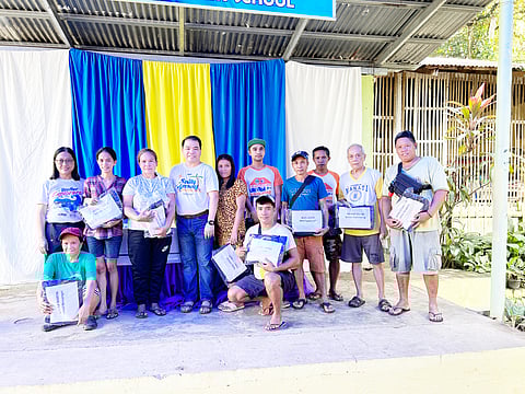 Brother Philippines president Glenn Hocson with the beneficiaries of this year’s Brigada Eskwela project.
