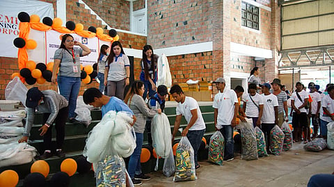 Fisherfolks from Semirara Island wait in queue as they receive their brand-new sets of fishing gear.