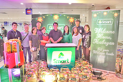 Balikbayans experience extraordinary homecoming at NAIA with Smart, MIAA