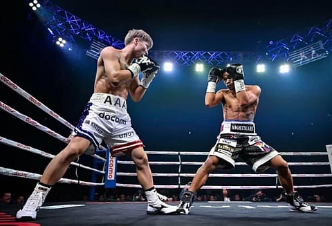 PHOTOGRAPH courtesy of Viva Promotions
Marlon Tapales (right) fails to become an undisputed champion after being stopped by Naoya Inoue barely a week before New Year’s Eve in their four-belt unification clash in Tokyo.