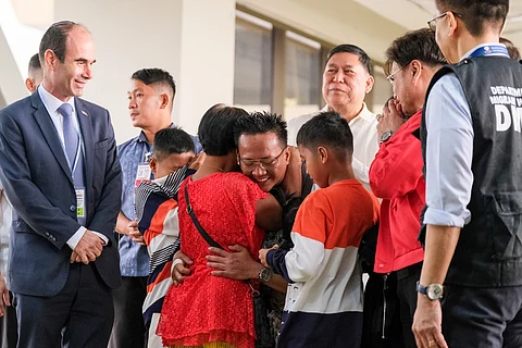 A freed Hamas hostage, OFW Gelienor "Jimmy" Pacheco, is reunited with his family on Monday,18 December 2023, after spending 49 days in captivity in conflict-torn Gaza. Israel Ambassador Ilan Fluss and other government officials greeted him upon his arrival at the NAIA Terminal. | Photo KING RODRIGUEZ.