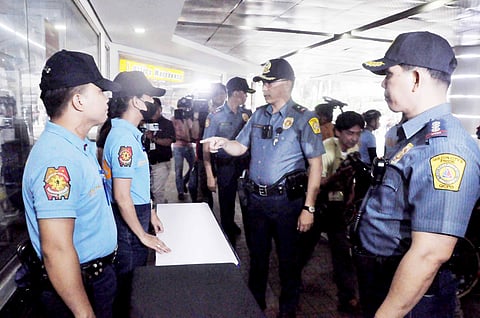 FILE: QUEZON City Police District chief PBGen. Redrico Maranan talks with police officers from the District Anti-Crime Reaction and Bike Patrol team stationed at the Gateway Mall in Cubao, Quezon City.