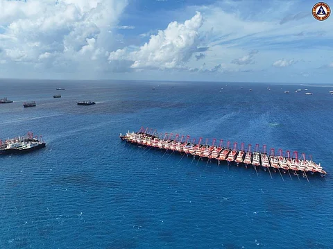 TIED side-by-side, Chinese militia vessels — numbering 135 in all — are spotted once again by the Philippine Coast Guard in the West Philippine Sea on Saturday. Doing what? Taking it from fishermen in the area, either reclaiming land or harvesting corals. TIED side-by-side, Chinese militia vessels — numbering 135 in all — are spotted once again by the Philippine Coast Guard in the West Philippine Sea on Saturday. Doing what? Taking it from fishermen in the area, either reclaiming land or harvesting corals.(Photograph courtesy of PCG)