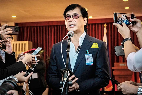 When duty calls Interior Secretary Benjamin Abalos Jr. reads President Ferdinand Romualdez Marcos Jr.'s statement canceling his Dubai trip to attend the 2023 United Nations Climate Change Conference, or Conference of the Parties (COP28), in Dubai. Marcos wants to focus on the urgent Red Sea hostage crisis involving 17 Filipino seafarers.(PHOTOGRAPH BY YUMMIE DINGDING FOR THE DAILY TRIBUNE @tribunephl_yumi)
