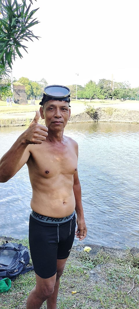 SOUTH Koreans mill in front of a television showing news on the intercontinental ballistic missile launch of North Korea. | Anthony WALLACE/AGENCE FRANCE-PRESSE