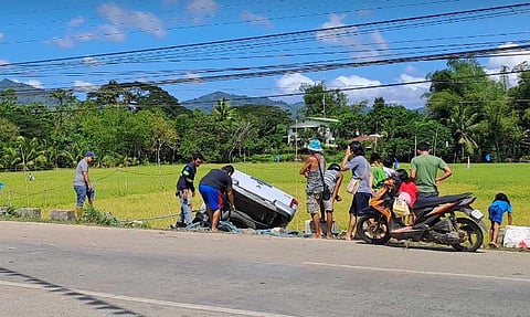 Kalayaan Vice Mayor Beltzasar Alindogan's pickup truck being removed from the ditch where it fell following an accident this morning, 10 December, in Puerto Princesa City.