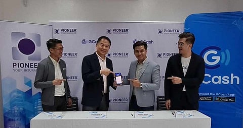 Pioneer Migrants Workers Head Leslie Chua, Pioneer Group Head Lorenzo Chan Jr., GCash VP, Group Head of New Businesses Winsley Bangit, and GInsure Head Joseph Niño Young during the MOA signing held recently.