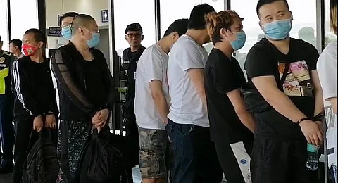 FILE: Chinese illegal POGO workers waiting to be deported at NAIA Terminal 1.