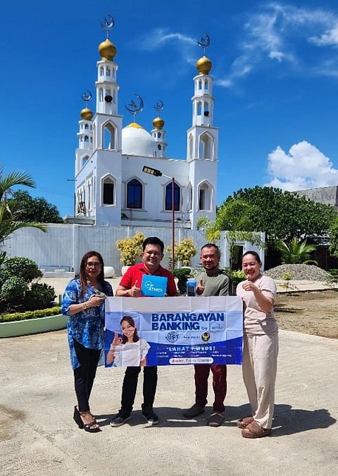From left to right: Zeny Abillera, Chief Financial Officer of PhilTech Inc.; Arnold Arbillera, Founder and CEO of PhilTech Inc.; Hon. Mohamad Faizal Jamalul, Municipal Mayor of Turtle Island, Tawi-Tawi, accompanied by his wife Mrs. Jay Sayang Jamalul, mark the commencement of RCBC’s Barangayan Banking on Turtle Island.