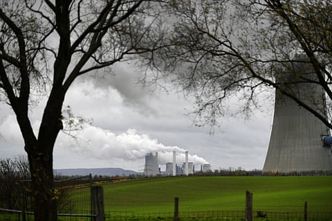FILE PHOTO: The picture shows the coal-fired power station of German energy giant RWE in Neurath, western Germany, 28 November 2019. (Photo by Ina FASSBENDER / AFP)