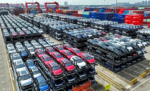FILE PHOTO: In this photo taken on 11 September 2023, BYD electric cars waiting to be loaded on a ship are stacked at the international container terminal of Taicang Port at Suzhou Port, in Chinas eastern Jiangsu Province. (Photo by AFP)