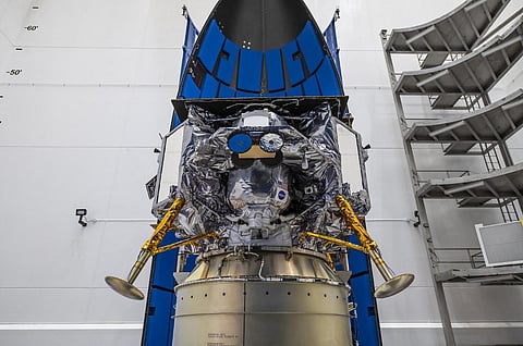 FILE PHOTO: This image released by NASA shows Astrobotic's Peregrine lunar lander being encapsulated in the payload fairing, or nose cone, of United Launch Alliance's Vulcan rocket on 21 November 2023, at Astrotech Space Operations Facility near the agency's Kennedy Space Center in Florida. (Photo by NASA / AFP)