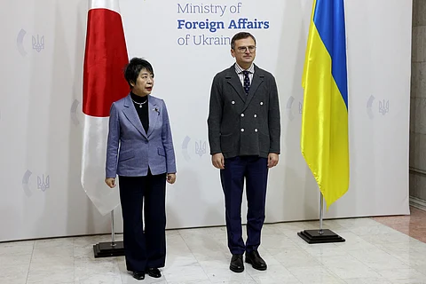Ukraine's Foreign Minister Dmytro Kuleba (R) poses with Japan's Foreign Minister Yoko Kamikawa (L) prior to their talks in Kyiv on January 7, 2024, amid the Russian invasion of Ukraine. (Photo by Anatolii STEPANOV / AFP)
