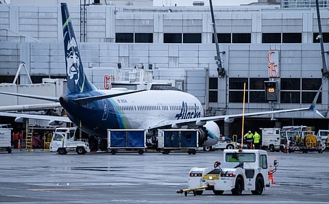 SEATTLE, WASHINGTON - JANUARY 6: An Alaska Airlines Boeing 737 MAX 9 plane sits at a gate at Seattle-Tacoma International Airport on January 6, 2024 in Seattle, Washington. Alaska Airlines grounded its 737 MAX 9 planes after part of a fuselage blew off during a flight from Portland Oregon to Ontario, California. (Photo by STEPHEN BRASHEAR / GETTY IMAGES NORTH AMERICA / Getty Images via AFP)