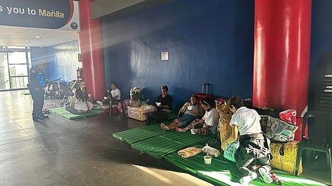 The Philippine Ports Authority lent sleeping mats to passengers on 28 December 2023 while they wait for their schedule from shipping lines. | Photo courtesy of the Philippine Ports Authority.