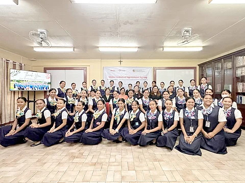 Banilad Center for Professional Development (BCPD) Women Scholars join executives from Aboitiz Foundation Inc. in a momentous MoA signing. | photographs courtesy of Aboitiz
