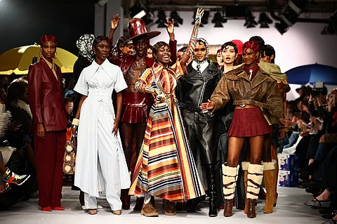 Models present creations by British-Nigerian designer Tolu Coker during a catwalk presentation for her Autumn/Winter 2024 collection during London Fashion Week in London, on 16 February 2024. (Photo by HENRY NICHOLLS / AFP)