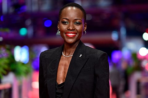Kenyan-Mexican actress and President of the International Jury 2024 Lupita Nyongo poses on the red carpet for the film "Another End" in competition at the 74th Berlinale International Film Festival in Berlin, on February 17, 2024. (Photo by JOHN MACDOUGALL / AFP)