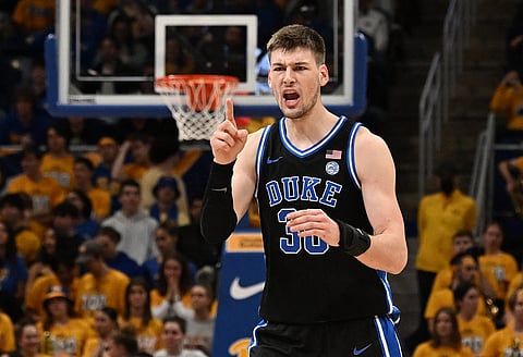 KYLE Filipowski of Duke suffers an injury after fans stormed into the court following Wake Forest’s 83-79 win in North Carolina in the US NCAA. | JUSTIN BERL/AGENCE FRANCE-PRESSE