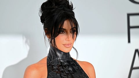 Kim Kardashian at the CFDA Fashion Awards. In the pendulum swings of fashion, "mob wife" is the natural reaction to last year's "quiet luxury", in which the ultra-wealthy sought to play down their vast riches with discreet and sober outfits. (ANGELA WEISS / AFP)