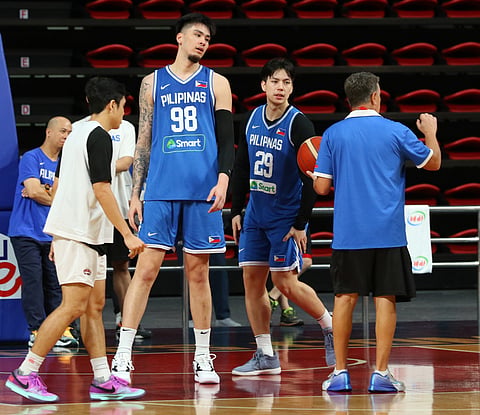 TIM Cone (right) serves as the guiding light of Kai Sotto (No. 98), Dwight Ramos (No. 29) and other young Gilas Pilipinas players. | photograph by Joey Sanchez Mendoza for the Daily Tribune