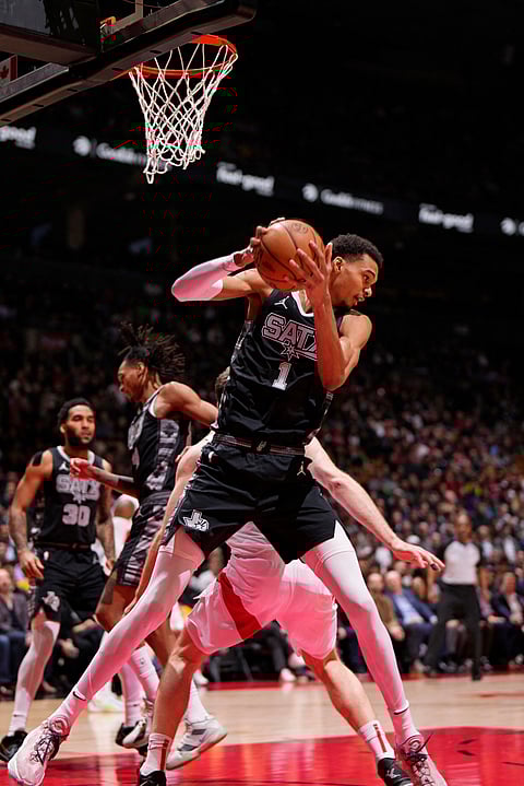 VICTOR Wembanyama posts a historic triple-double of 27 points, 14 rebounds and 10 blocks to power the San Antonio Spurs to a 122-99 win over the Toronto Raptors. | MARK BLINCH/AGENCE FRANCE-PRESSE