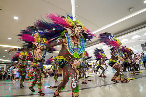Iloilo’s Dinagyang (merrymaking) festival mesmerizes with Ilonggo ‘warriors’ in colorful tribal costumes simulating Ati tribes dancing to the beat of drums.
