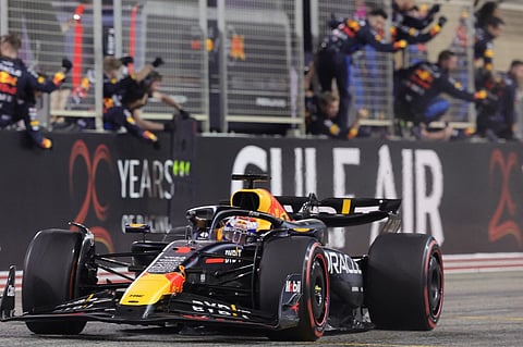 Red Bull Racing's Dutch driver Max Verstappen crosses the finish line to win the Bahrain Formula One Grand Prix at the Bahrain International Circuit in Sakhir on March 2, 2024.