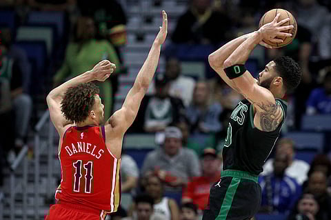 Jayson Tatum scatters 23 points to help the Boston Celtics rip the New Orleans Pelicans, 104-92, in their NBA regular season game. | SEAN GARDNER/Agence France-Presse