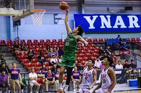JONNEL Policarpio of EcoOil-La Salle soars for a dunk during their PBA D-League Aspirants Cup game against Centro Escolar University. The Green Archers won, 89-61. | PHOTOGRAPH COURTESY
OF D-LEAGUE
