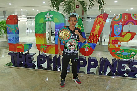 Melvin Jerusalem arrives at the Ninoy Aquino International Airport Terminal 1 a day after becoming the WBC minimumweight champion. | photograph by Joey Sanchez Mendoza for the Daily Tribune @tribunephl_joey