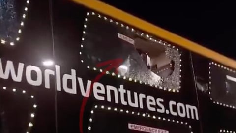 The Delhi-Srinagar luxury bus whose windows were damaged after bricks were allegedly hurled at it in Haryana.