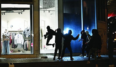 French PM calls for city curfews to curb unrest