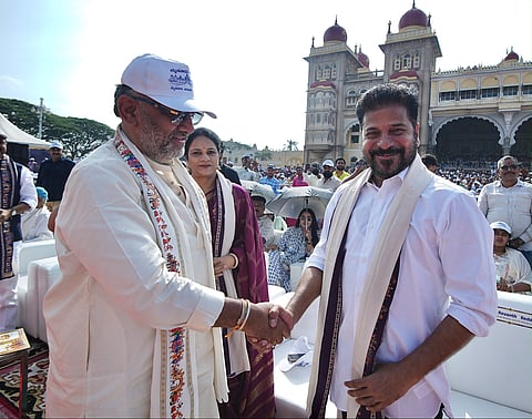 Karnataka Chief Minister D.K. Shiva Kumar greeted the Telangana Chief Minister A. Revanth Reddy during the Mysore Dasara festivals on Wednesday.