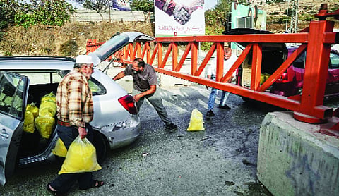 Israel shuts West Bank city amid Mideast tensions